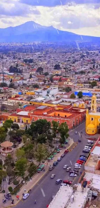 Aerial view of vibrant cityscape with mountains.