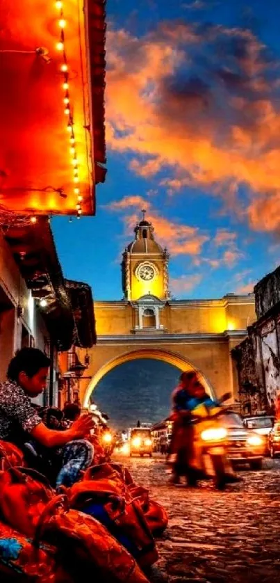 Colorful evening cityscape with lit street and sky.