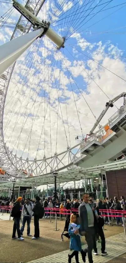 Ferris wheel against a vibrant blue sky.