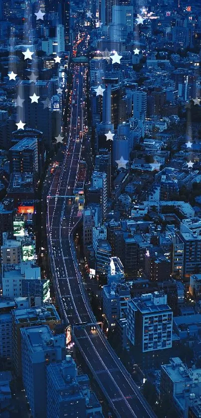 Aerial view of cityscape at night with glowing lights and deep blue tones.