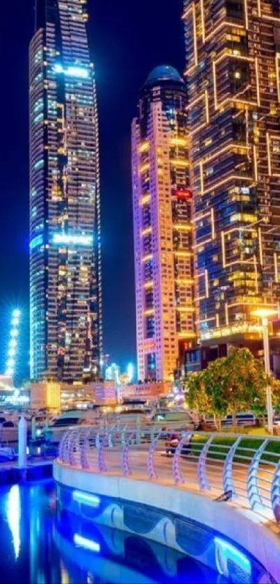 Illuminated skyscrapers reflecting in a night cityscape