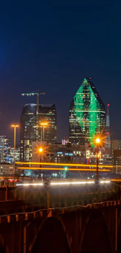 Vibrant cityscape with illuminated skyline at night.