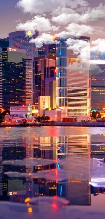 City skyline with colorful reflections at dusk.