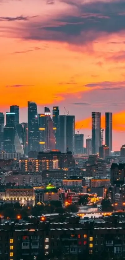 A vibrant city skyline glowing under a vibrant orange sunset.