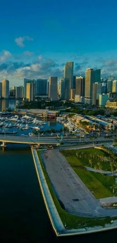 Aerial view of a vibrant cityscape featuring towering skyscrapers by the waterfront.