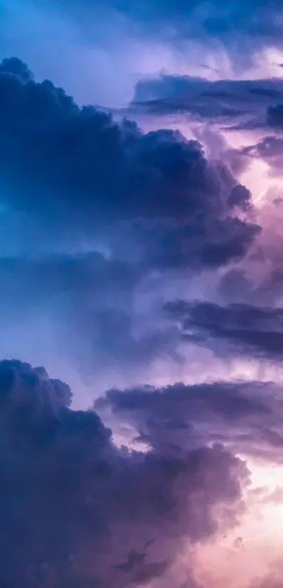 Vibrant purple and blue cloudy sky wallpaper.