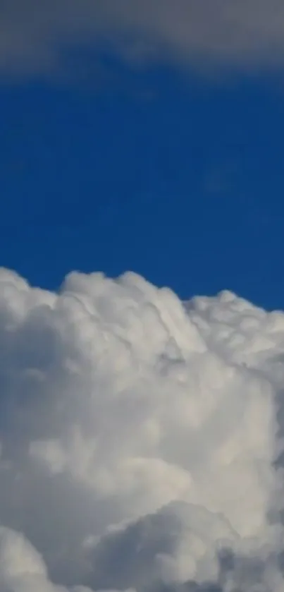 Majestic cloudy sky with vibrant blue hue background.