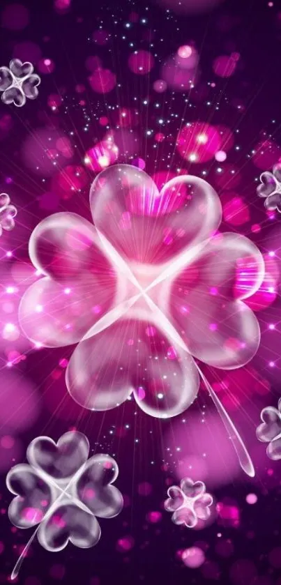 Vibrant clover mobile wallpaper in pink hues.