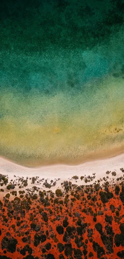 Aerial view of vibrant coastline with aqua waters and red earth.