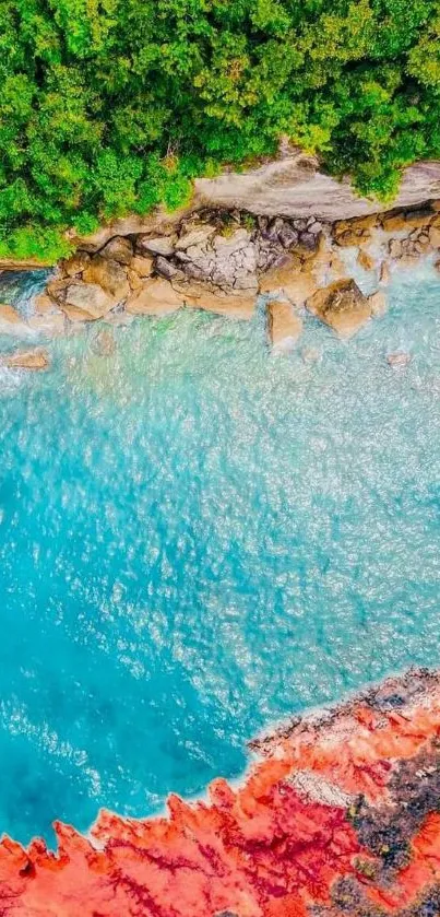 A vibrant aerial view of a colorful coastline with rocks, clear waters, and greenery.