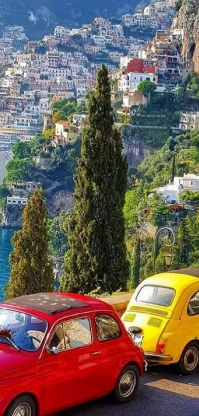 Vintage cars driving along a scenic coastal road in Italy.