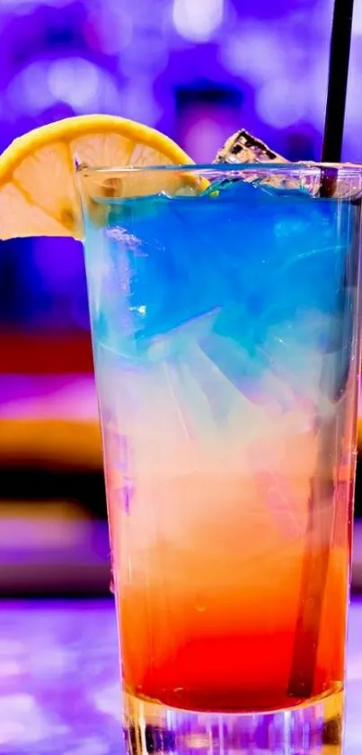 Colorful cocktail with lemon slice and straw.