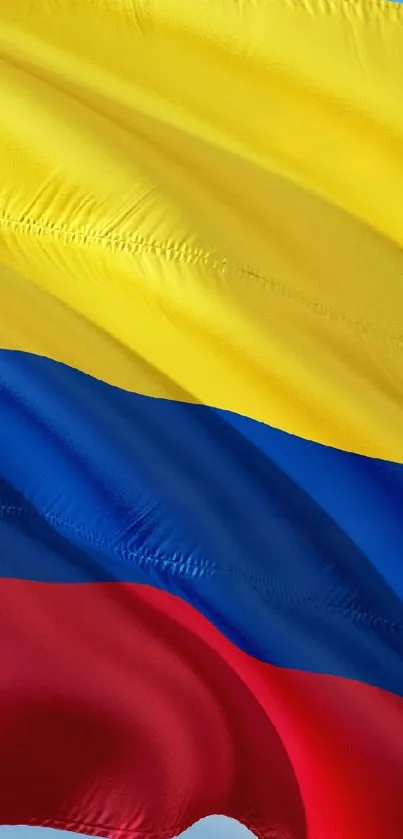 Vibrant Colombian flag with yellow, blue, and red stripes.