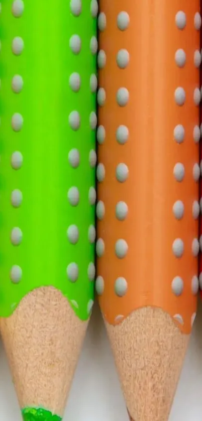 Colorful pencils with polka dots for a vibrant wallpaper.