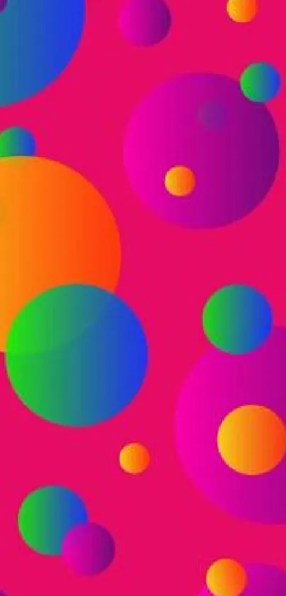 Vibrant wallpaper with colorful overlapping circles on pink background.