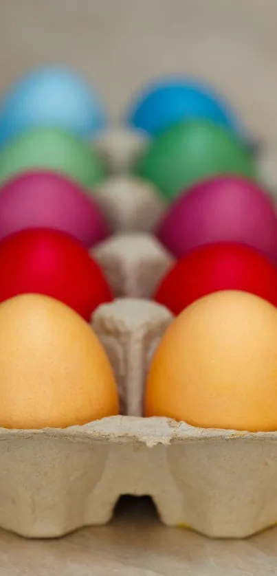 Colorful eggs arranged in a carton, vibrant and artistic.