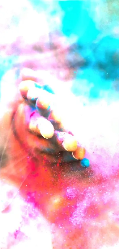 Hand with vibrant colored powder in dynamic artwork.