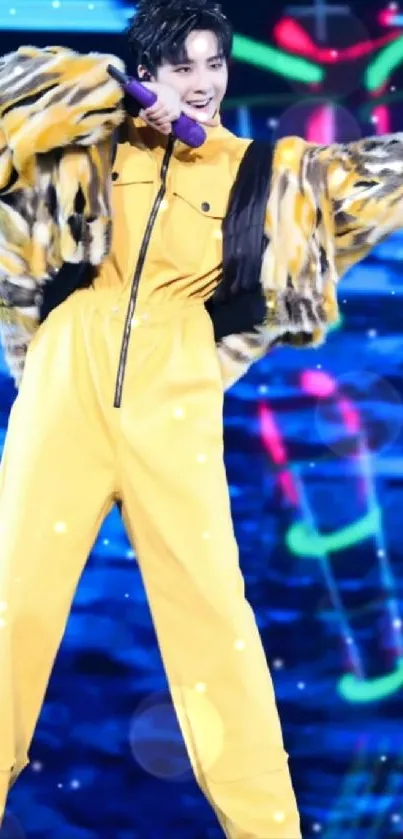 Vibrant performer in a yellow outfit on a neon-lit stage.