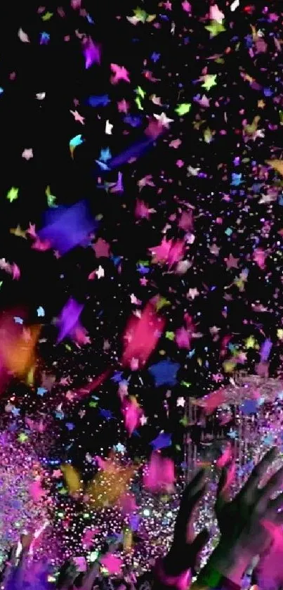 Vibrant confetti shower with lifted hands celebrating in colorful hues.