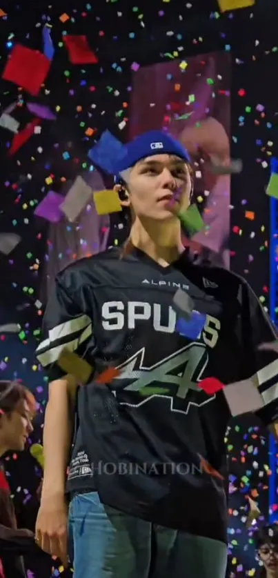 Person standing amid colorful confetti.