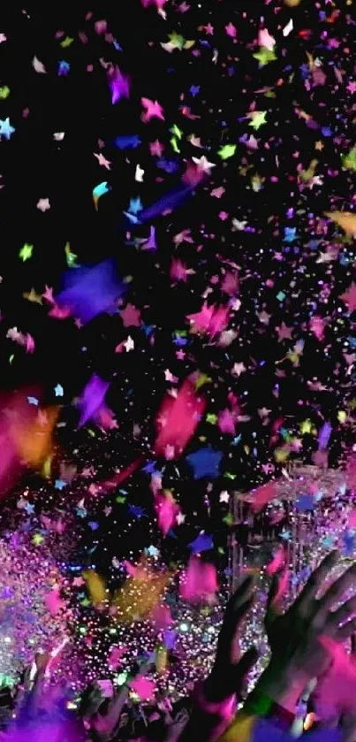 Vibrant confetti stars celebration wallpaper with colorful sparkles.