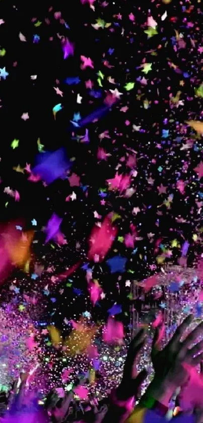 Vibrant confetti fills the air at a colorful celebration event.
