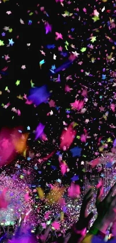 A vibrant confetti explosion with colorful stars and hands in celebration.