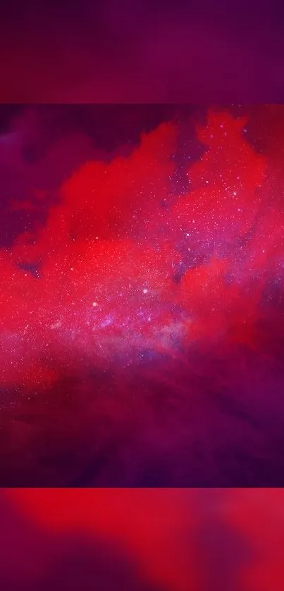 Vibrant red and purple nebula space wallpaper.