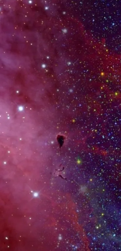 Beautiful purple nebula with stars in deep space wallpaper.