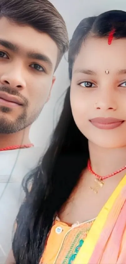 Vibrant portrait of a couple in colorful cultural attire.