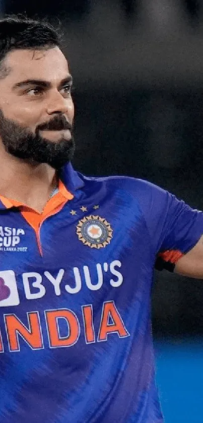 Cricketer celebrating victory with bat held high in a vibrant blue jersey.