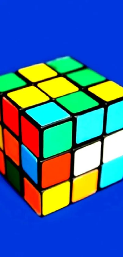 Colorful Rubik's Cube on a blue background wallpaper.