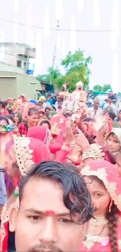 Crowd enjoying a vibrant cultural celebration in colorful traditional attire.