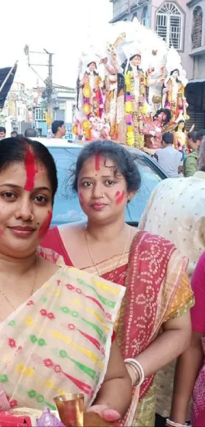 People in colorful traditional attire celebrating a vibrant festival outdoors.