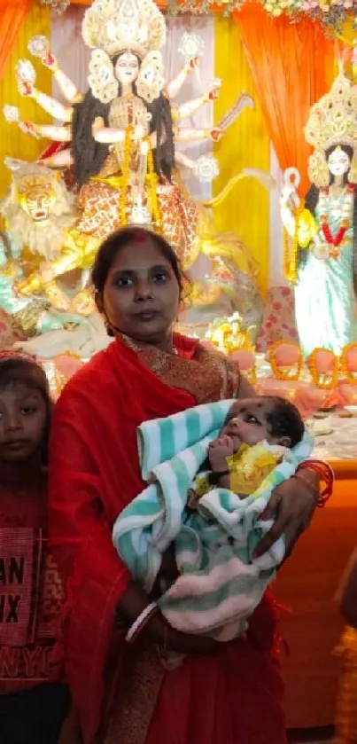 Family in traditional attire at a vibrant cultural festival with colorful decor.