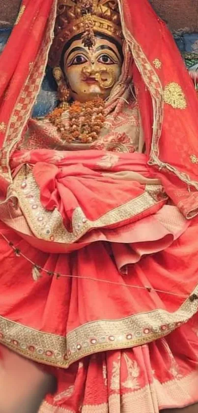 Vibrant goddess image with traditional red attire, showcasing cultural richness.