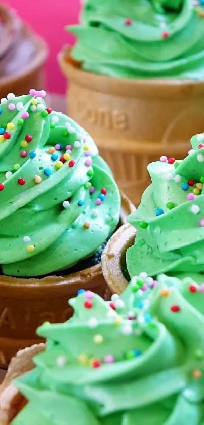 Green icing cupcakes with colorful sprinkles in ice cream cone bases.
