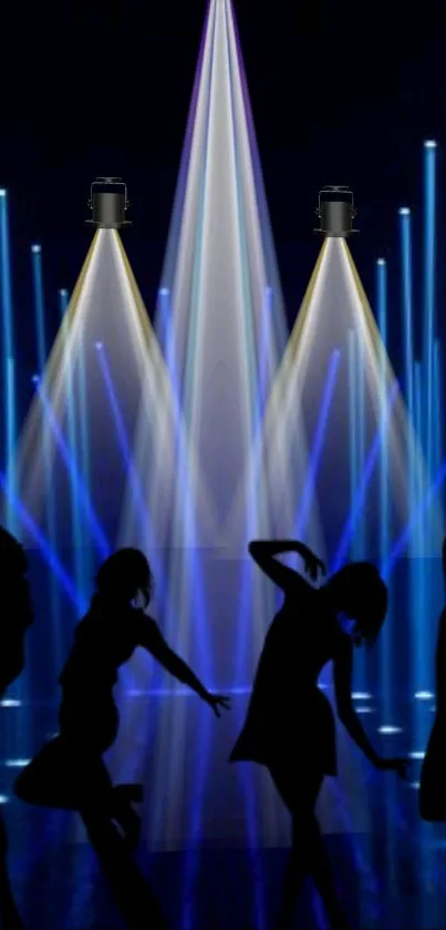 Silhouetted figures dance under vibrant blue lights in a club setting.