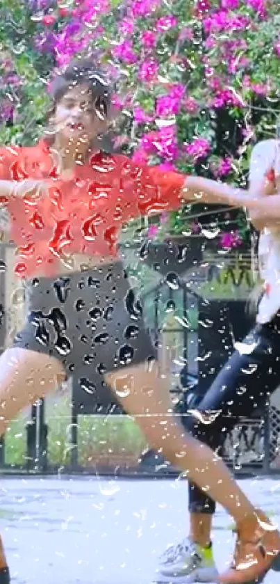 Dancers through raindrop-covered glass in a vibrant setting.