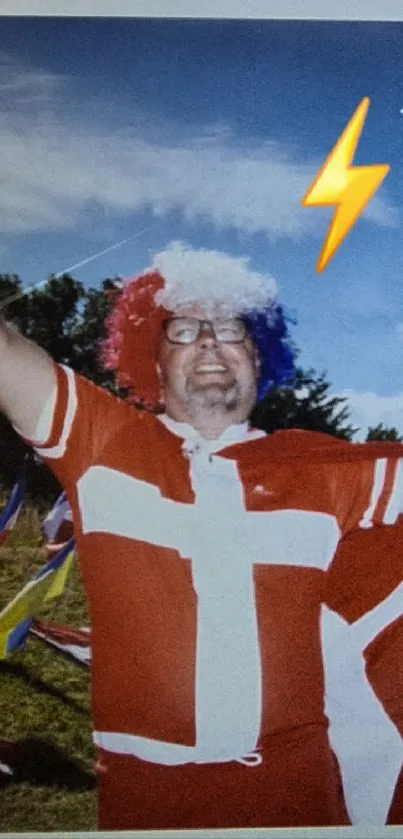 Danish fan waving flag on a sunny day.