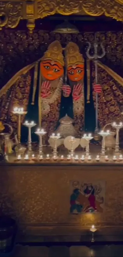 Candlelit Hindu shrine with vibrant deities and golden altar.