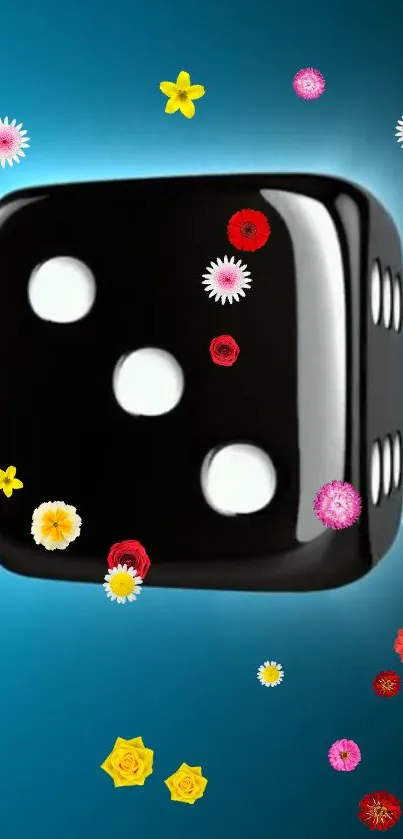 Glossy black dice with colorful flowers on turquoise background.