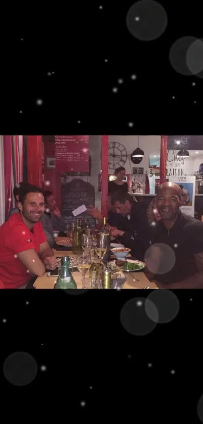 Friends enjoying a dinner gathering in a vibrant setting with red accents.