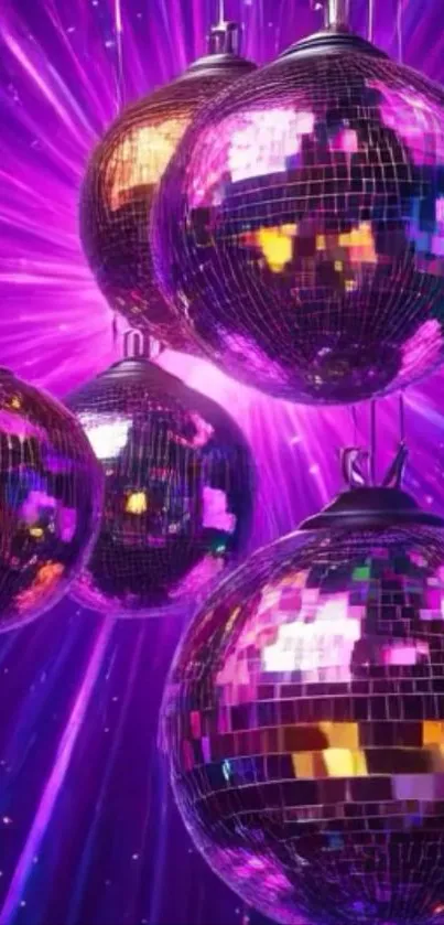 Colorful disco balls with vibrant purple lights.