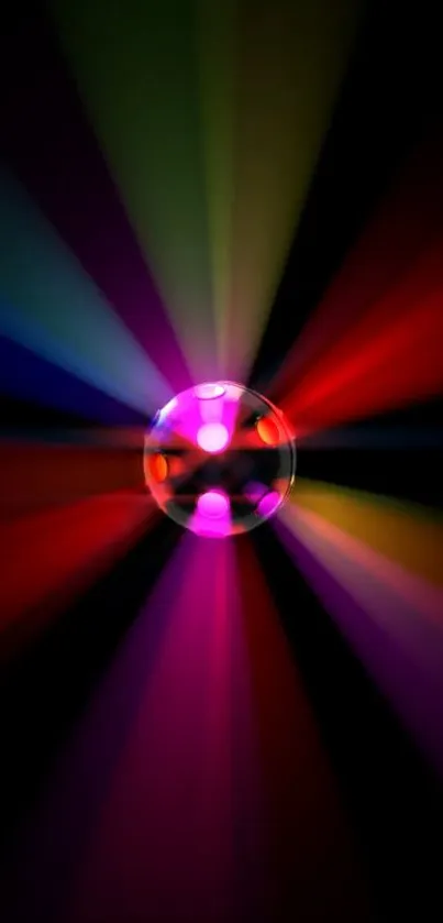 Colorful disco ball with vibrant light rays on a dark background.