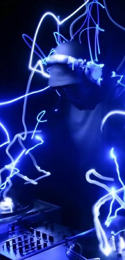 DJ performing with neon blue glow effects on dark background.