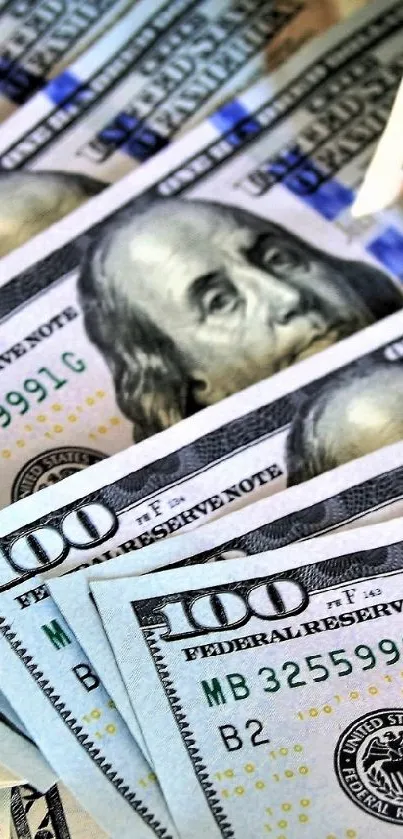 High-resolution image of stacked US dollar bills in vibrant green hues.