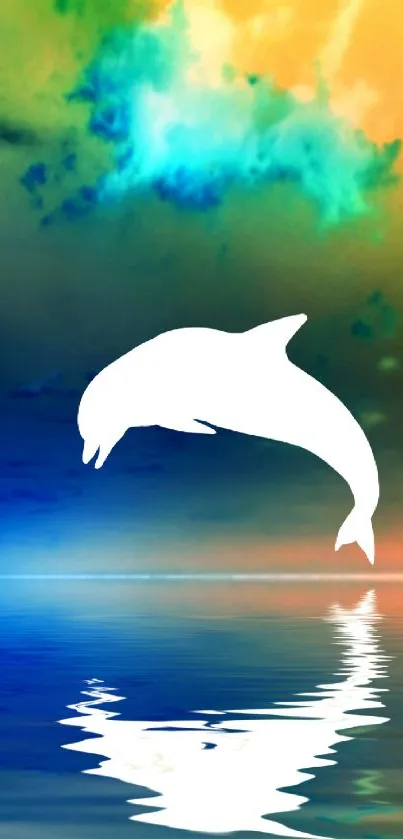 Jumping dolphin silhouette on colorful sky background.