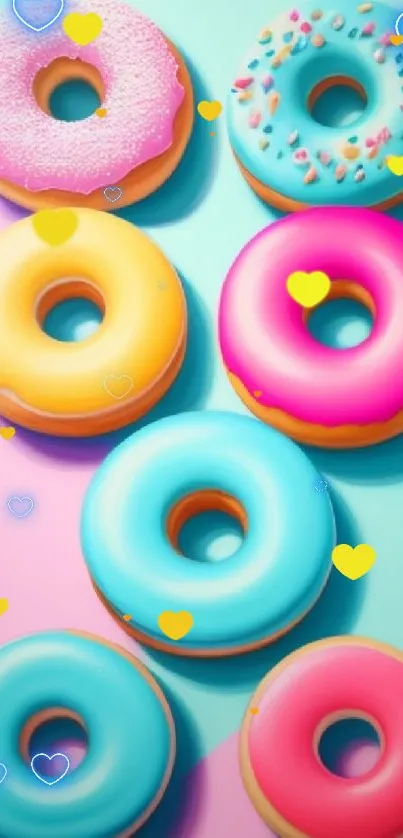 Vibrant wallpaper with colorful donuts on an aqua and pink background.