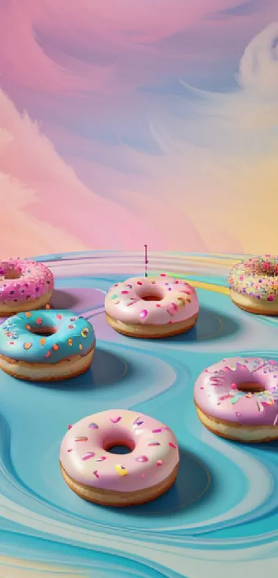 Colorful donuts on a pastel dreamscape background with pink and blue hues.